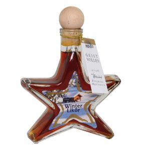 Eine schöne Glasflasche in Form eines Sternes verschlossen mit einem Holzgriffkorken in Kugelform und gefüllt mit 100 ml Lebkuchen-Likör 20%. Maße: ca. L11 x B4 x H16 cm.<br>