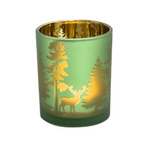 Moderner Teelichthalter mit einer edlen Beschichtung und goldfarbener Wald-Silhouette. Maße: ca. H7,5 x D6 cm, Material: Glas.<br>
