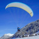 Gleitschirm-Tandemflug mit Ski-Start Raum Davos